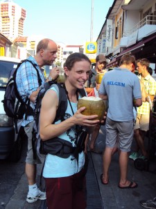 Drinking coconut milk in Little India!